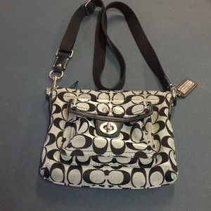 Coach black crossbody in signature jacquard.